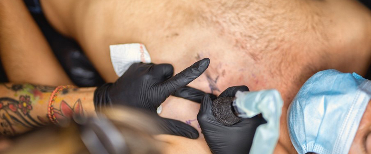 Tatouage dos Kila Studio salon de tatouage nice-tatouage cannes-maquillage semi permanent toulon-onglerie brignoles-tattoo alpes maritimes-vernis semi permanent var